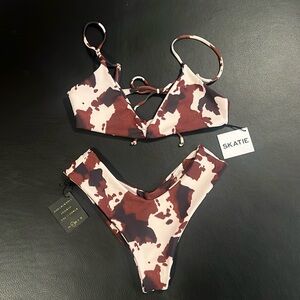 SKATIE brand cow print swim suit